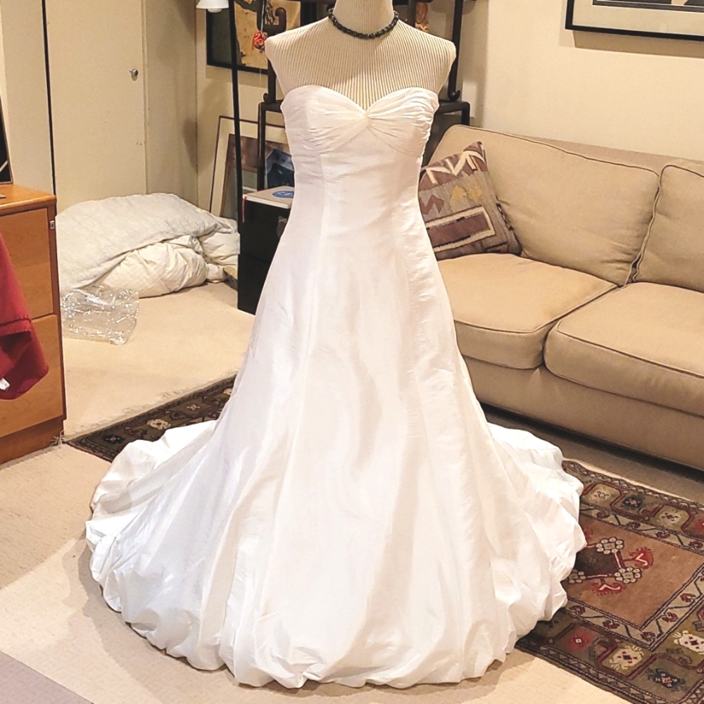 White taffeta sweetheart pleated bust bridal gown